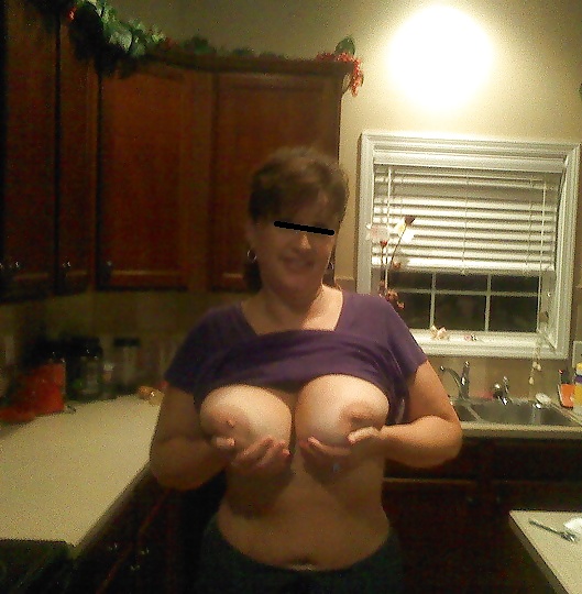 Thick Married MILF posing for the camera porn pictures