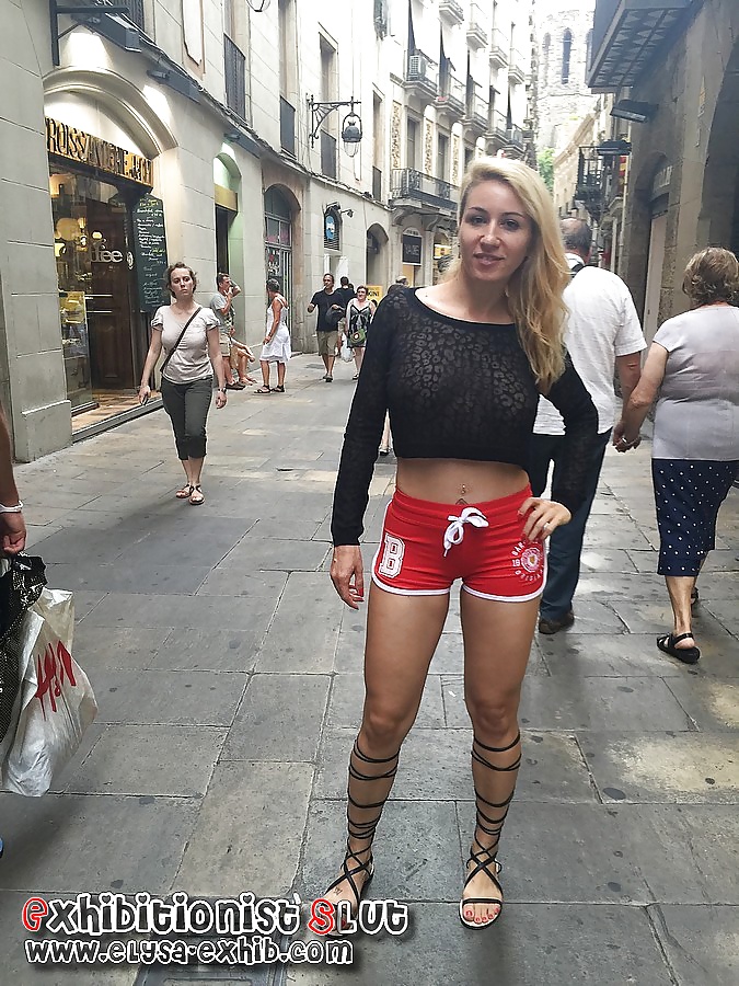 Flashing in public in Barcelona with a transparent top porn pictures