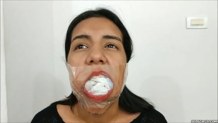 gagged with    socks and clear tape gag selfgags         