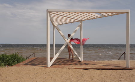 red shawl on windy weather         