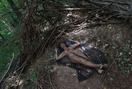 in forest cradle with apple         