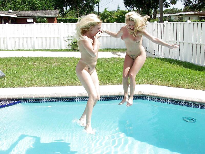 Lesbian swimming pool party. porn pictures