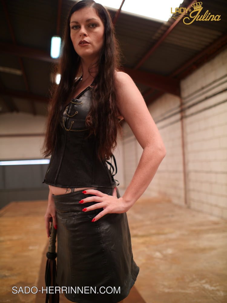 Mistress Lady Julina wears leather skirt and pantyhose - 8 Pics 