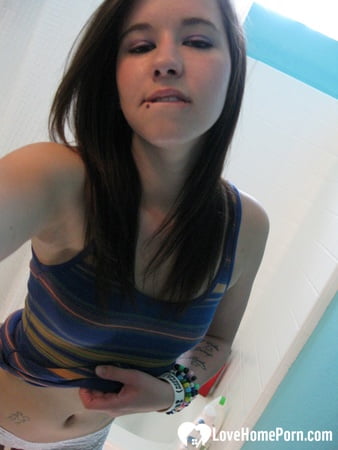 passionate teen moans while playing with herself         