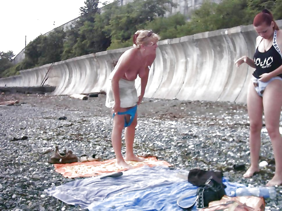 Sluts are changing at the beach porn pictures