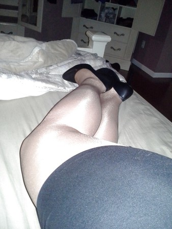 Wife in shiny pantyhose