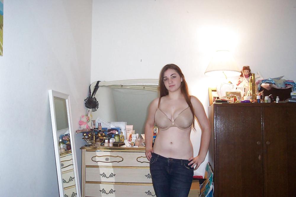 Young student loves her natural boobs - N. C. porn pictures