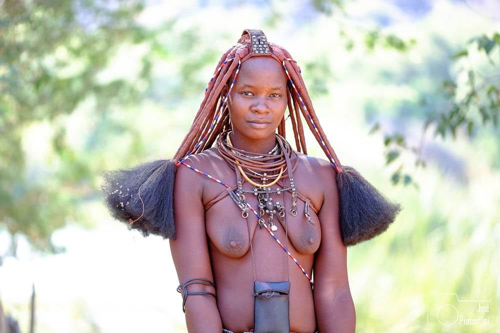 Japanese girl hanging out with african natives