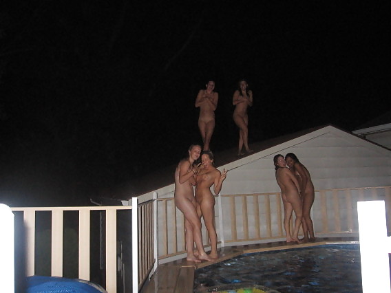 Naked girls playing in a pool by night porn pictures