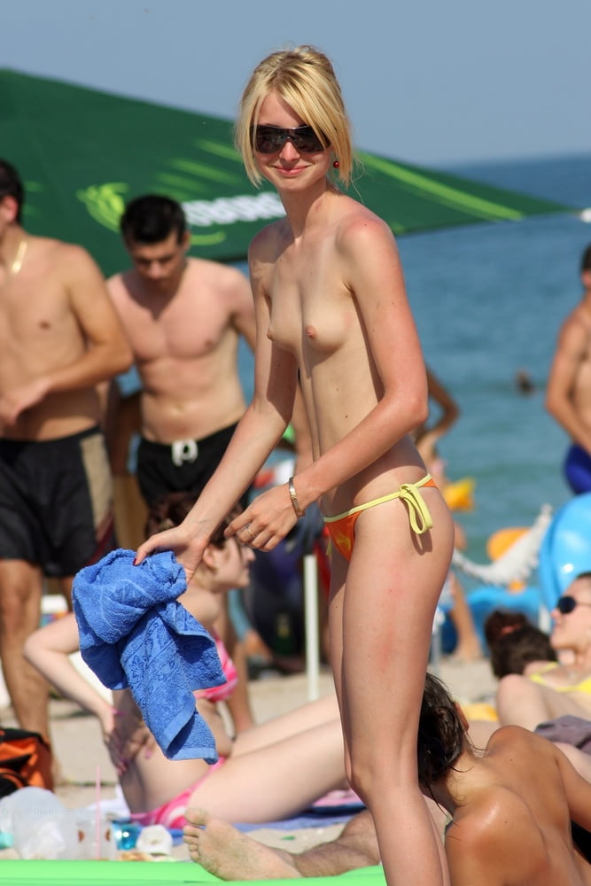 Small titties, hard nipples, beach porn pictures