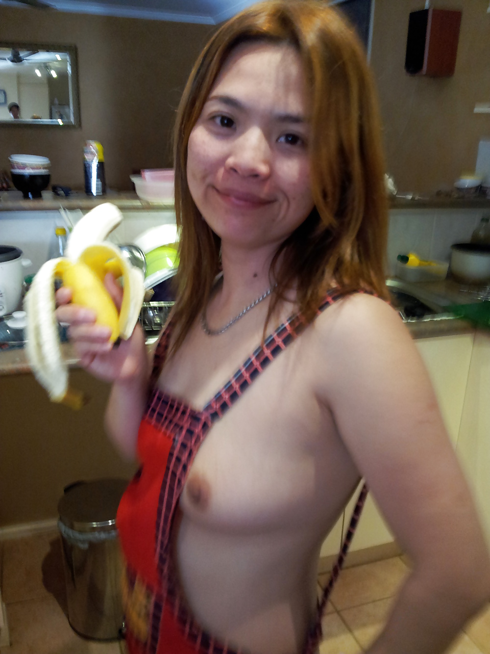 chinese wife posing in kitchen porn pictures