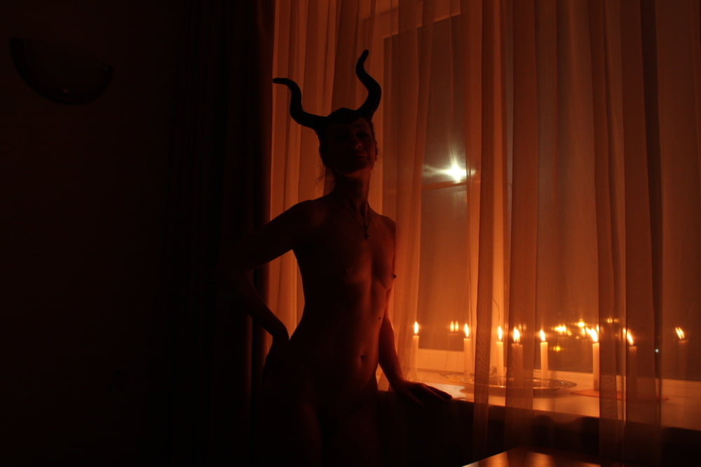 Naked Maleficent with Candles - 24 Photos 