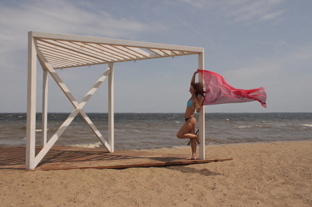 red shawl on windy weather         