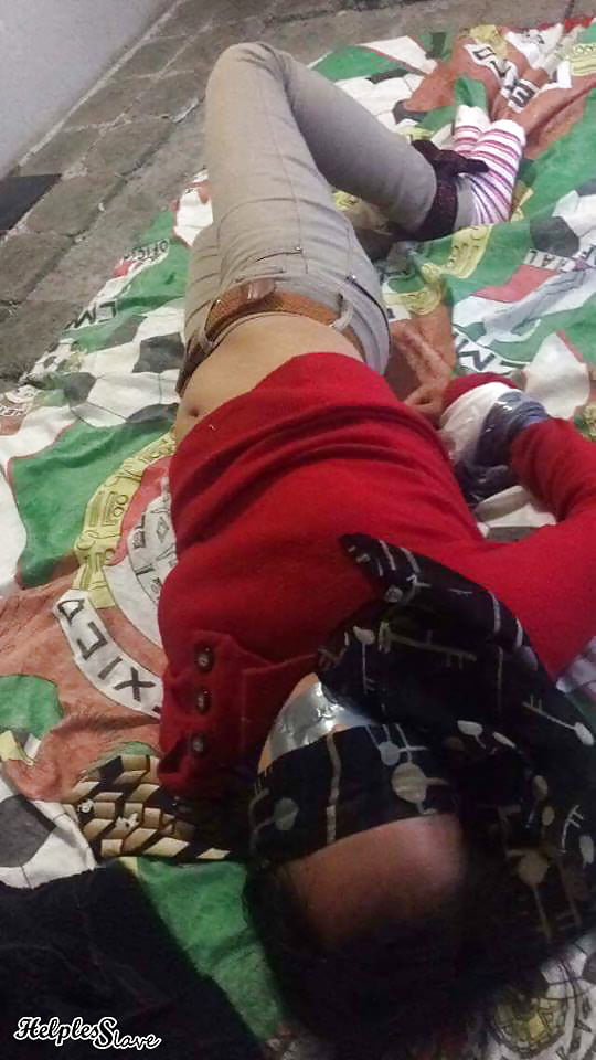 Helpless slave Elizabeth Alaniz porn pictures