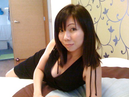 Pretty Singaporean takes pictures of her breasts