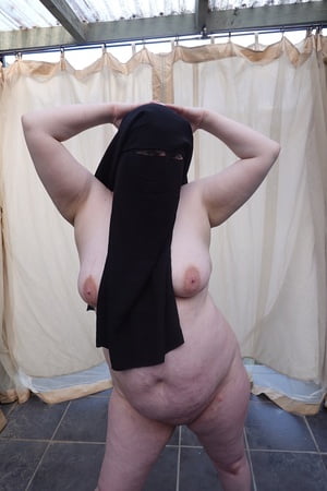 nude in niqab in ankle boots         