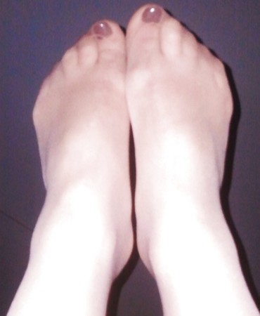 nail polish feet in nylon pantyhose