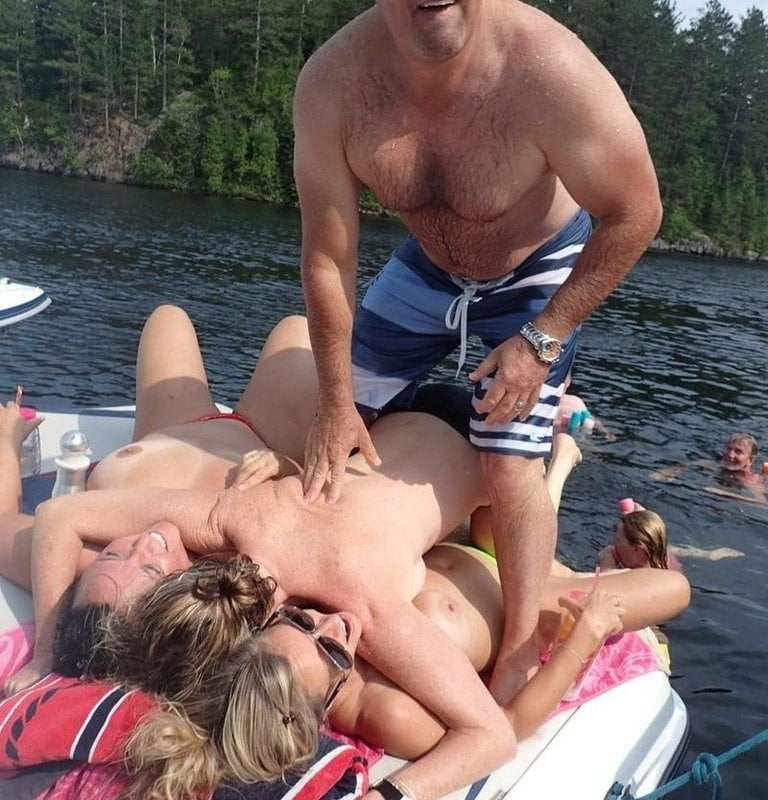 Several couples, partying on a boat - 60 Photos 