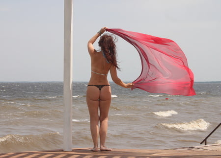red shawl on windy weather         
