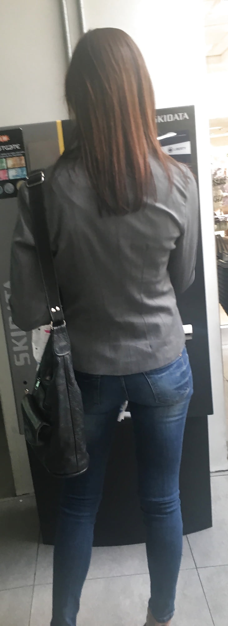 Lovely skinny milf at the mall porn pictures