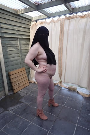 nude in niqab in ankle boots         