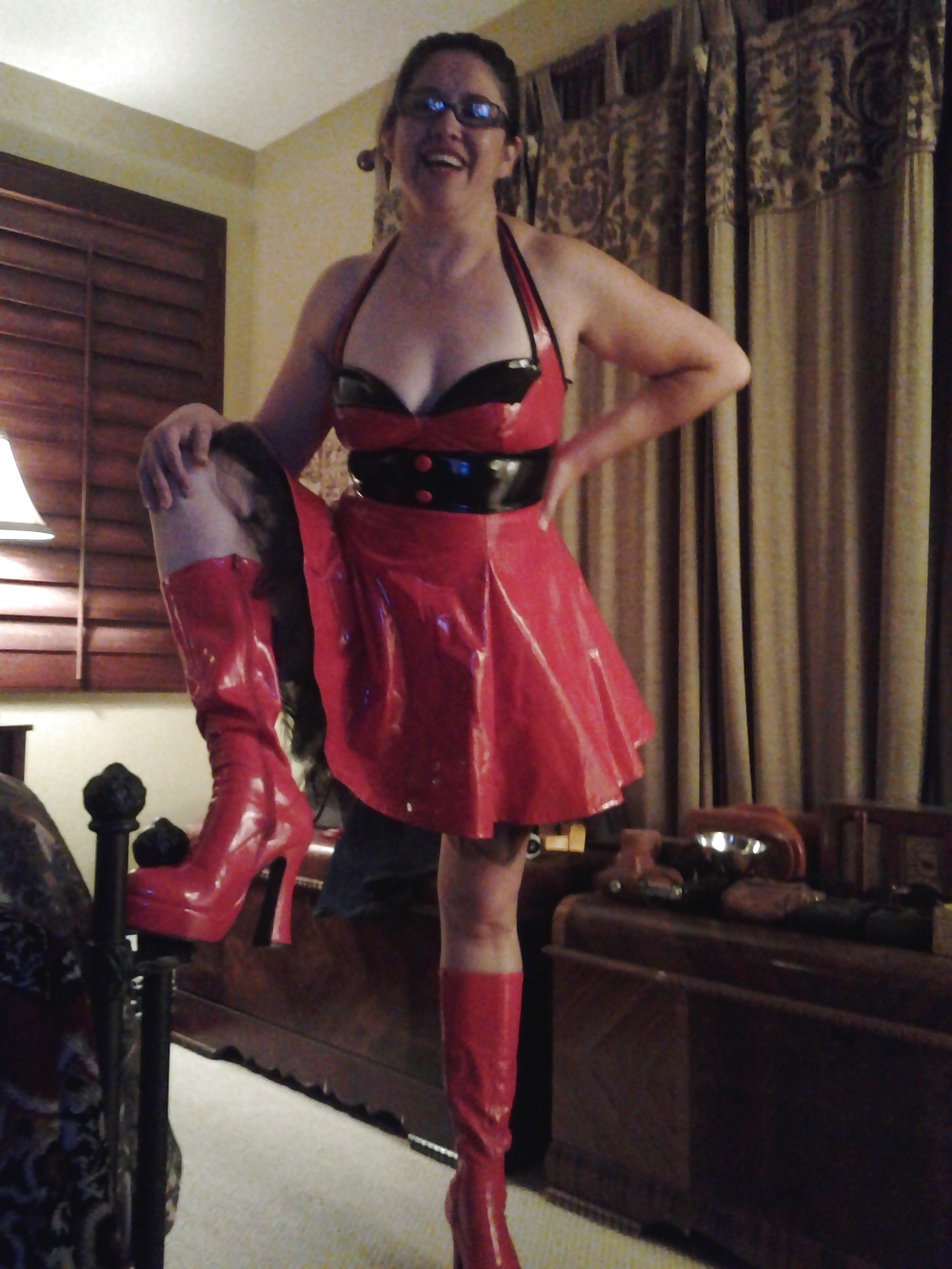 MILF in red vinyl PVC fetish dress and boots porn pictures