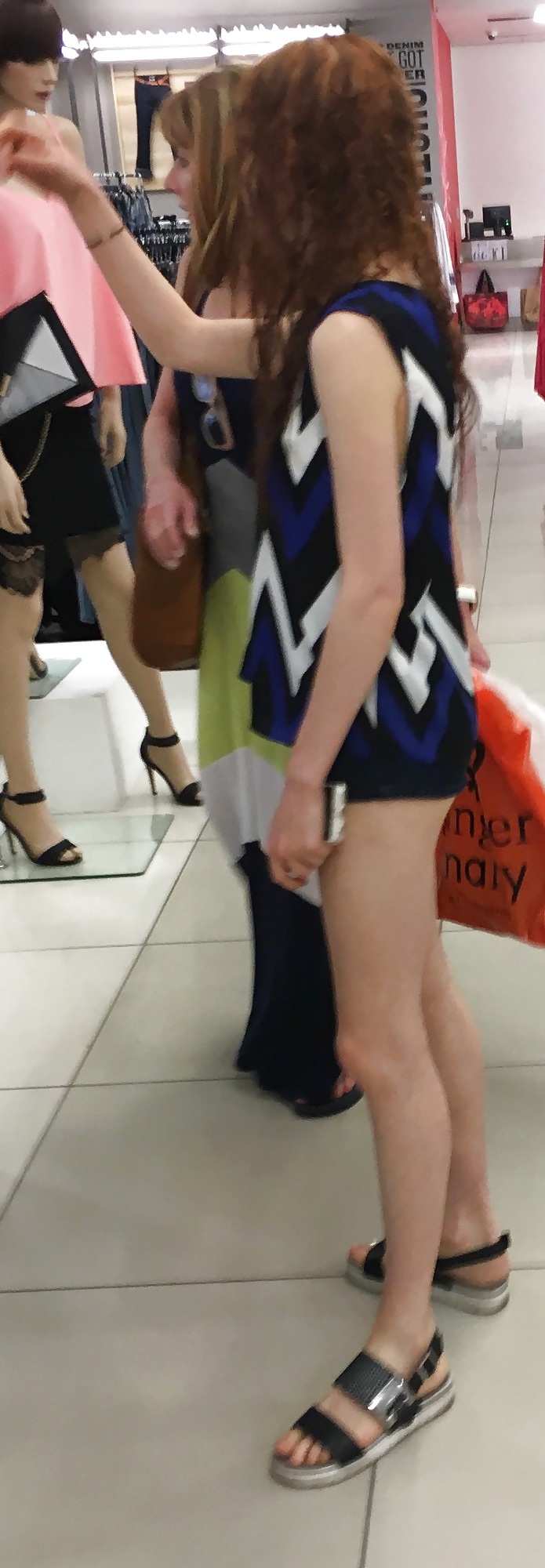 Tiny redhead mall teen in tiny shorts with a tiny ass porn pictures