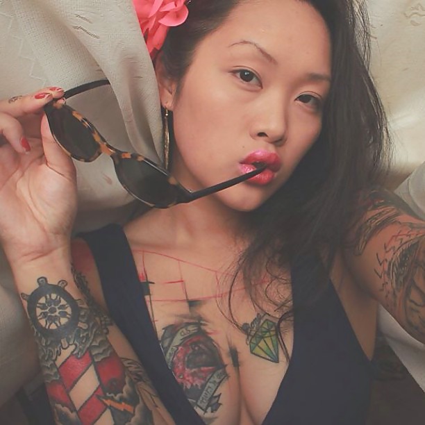 Tattooed Asian Teen porn pictures