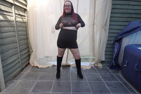 transparent top with miniskirt and boots         