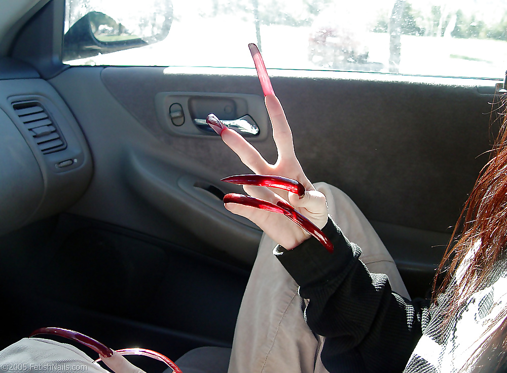 Trixie's dark red pointy extremely long claws porn pictures