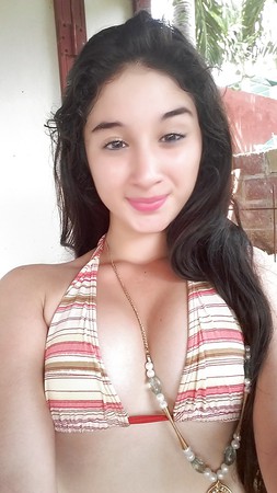 Young amateur latina whore in bikini (non nude)