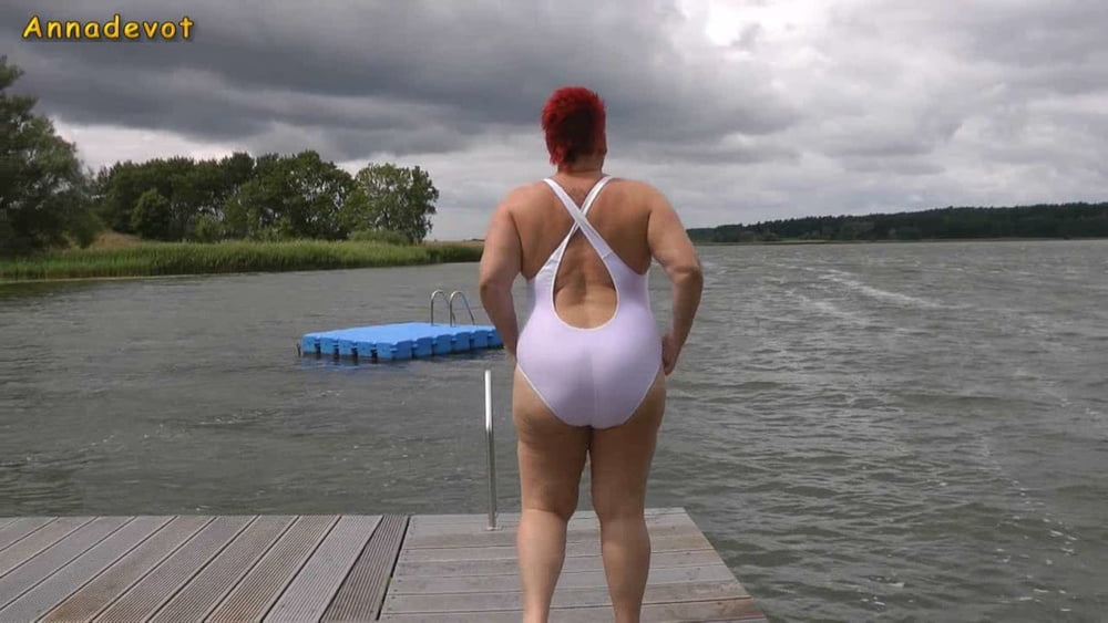 In WHITE SWIMSUIT in the lake - 15 Photos 