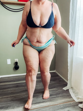 bbw tries on a micro bikini striping down and gets naked         