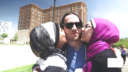 Veiled Arab slut kissing white dude