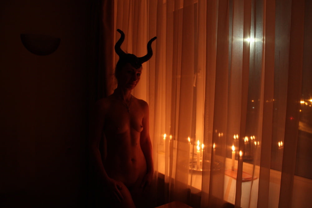 Naked Maleficent with Candles - 24 Photos 